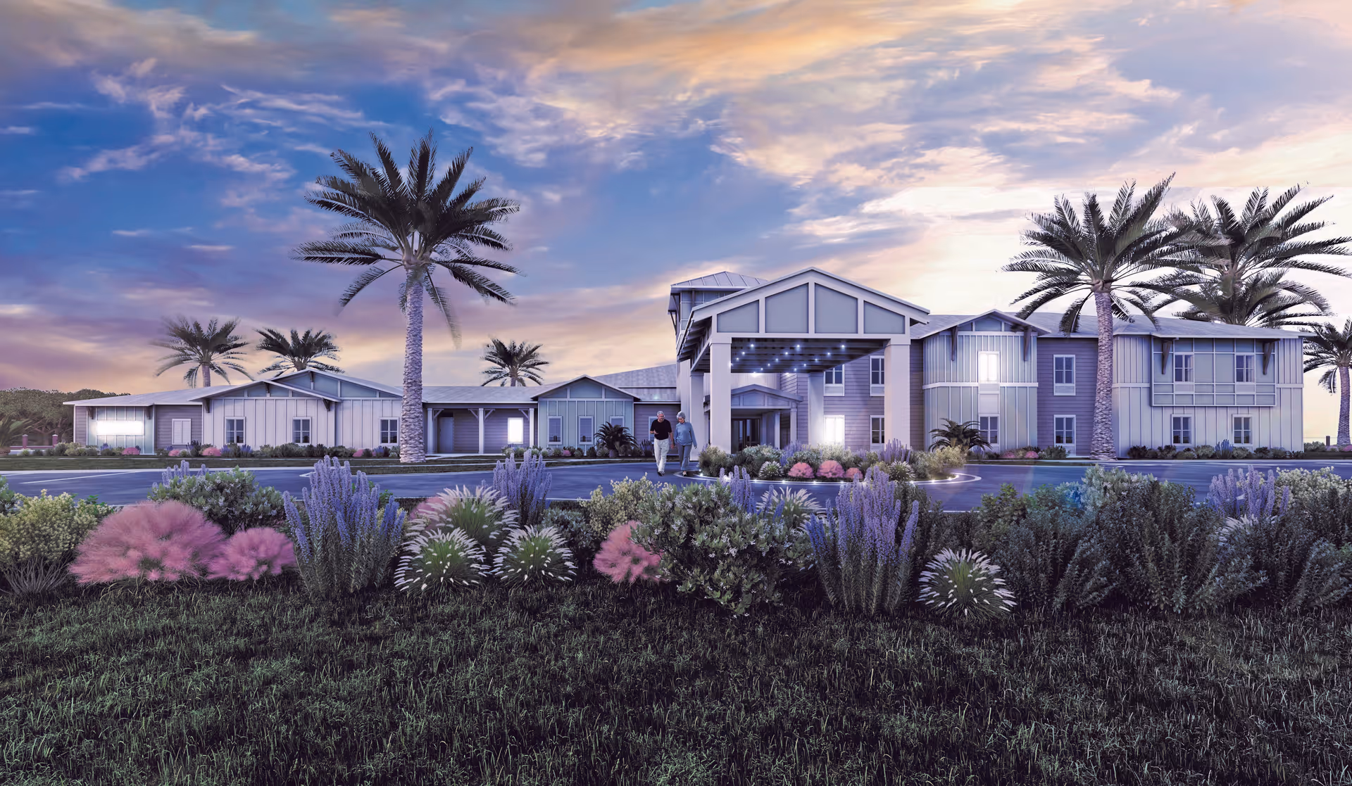 Exterior view of a senior living facility named The Canopy at Walden Woods during sunset, featuring a modern two-story building with a covered entrance, palm trees, and landscaped gardens with various shrubs and flowers in the foreground.