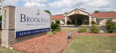 Brookdale Medical Center Kingsley exterior entrance with sign and landscaped front yard.