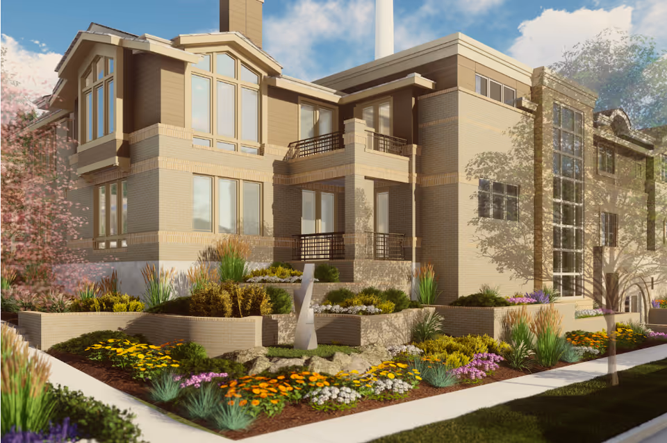 Exterior view of a multi-story senior living facility with large windows, balconies, and well-maintained landscaped garden featuring colorful flowers and shrubs under a blue sky.