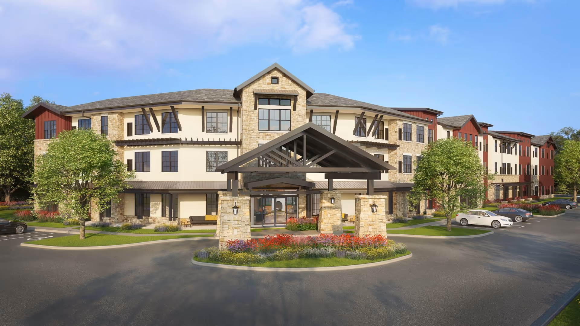 Exterior view of Longleaf Bee Cave senior living facility with entrance canopy and landscaped roundabout.