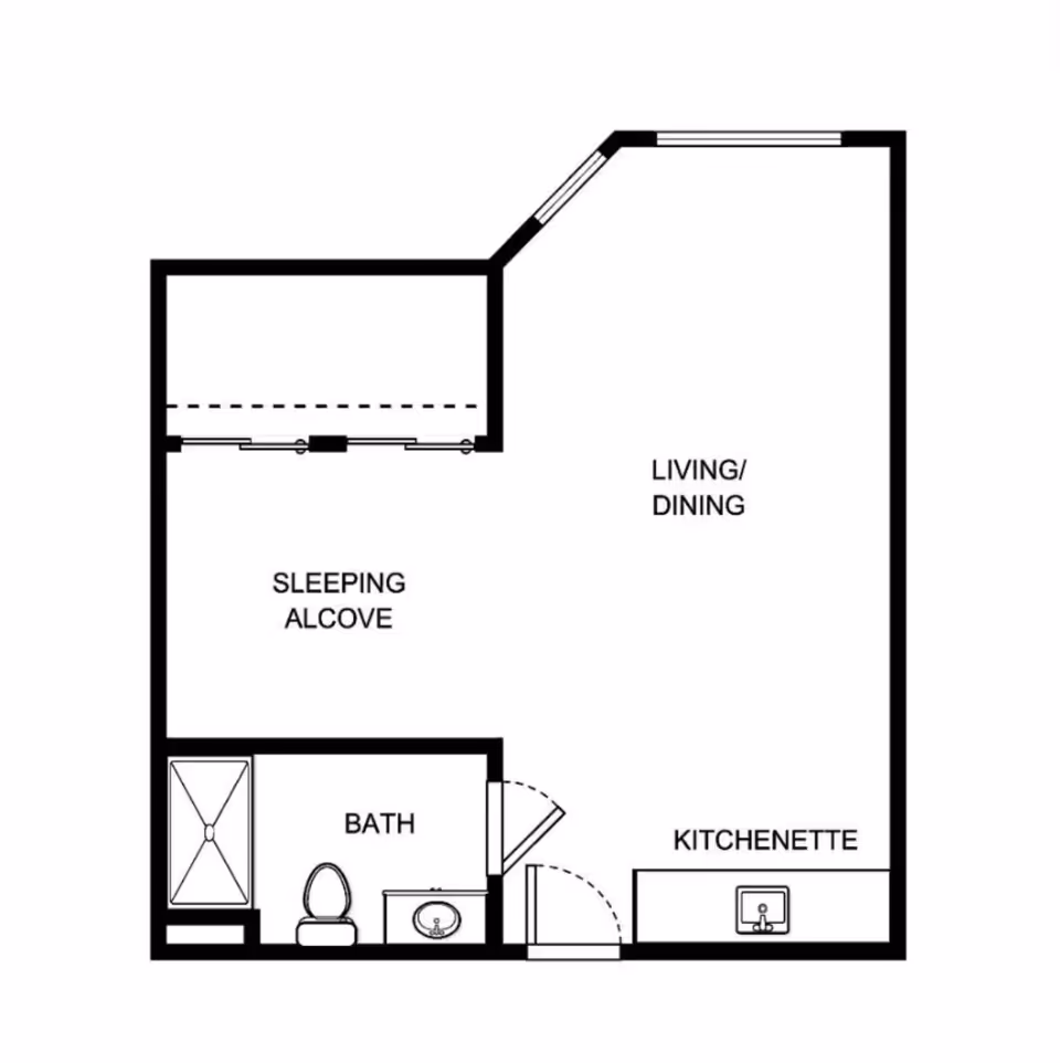 Floor plan of a studio apartment layout showing a sleeping alcove, bath with shower, toilet, and sink, living/dining area, and a kitchenette with a sink.