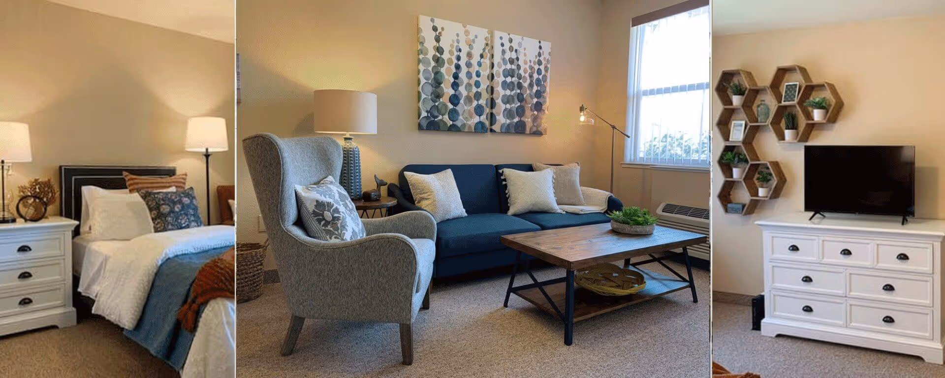 Furnished suite showing a bedroom on the left and a living room with a sofa, armchair, coffee table and TV console on the right.