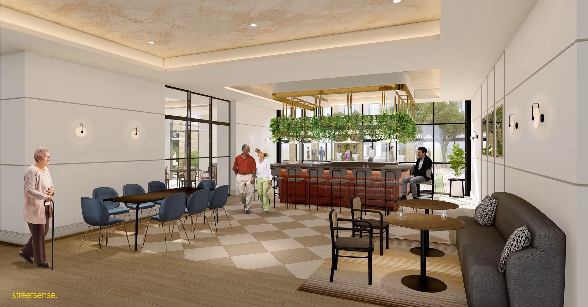 A modern senior living facility common area with a mix of seating options including a long table with blue chairs, a bar with high stools and hanging greenery, and a lounge area with a sofa and small round tables. Several seniors are seen walking and sitting, with large windows letting in natural light and views of outdoor greenery.