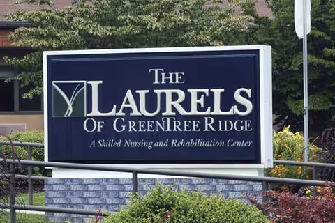 Outdoor sign for The Laurels of GreenTree Ridge nursing and rehabilitation center.