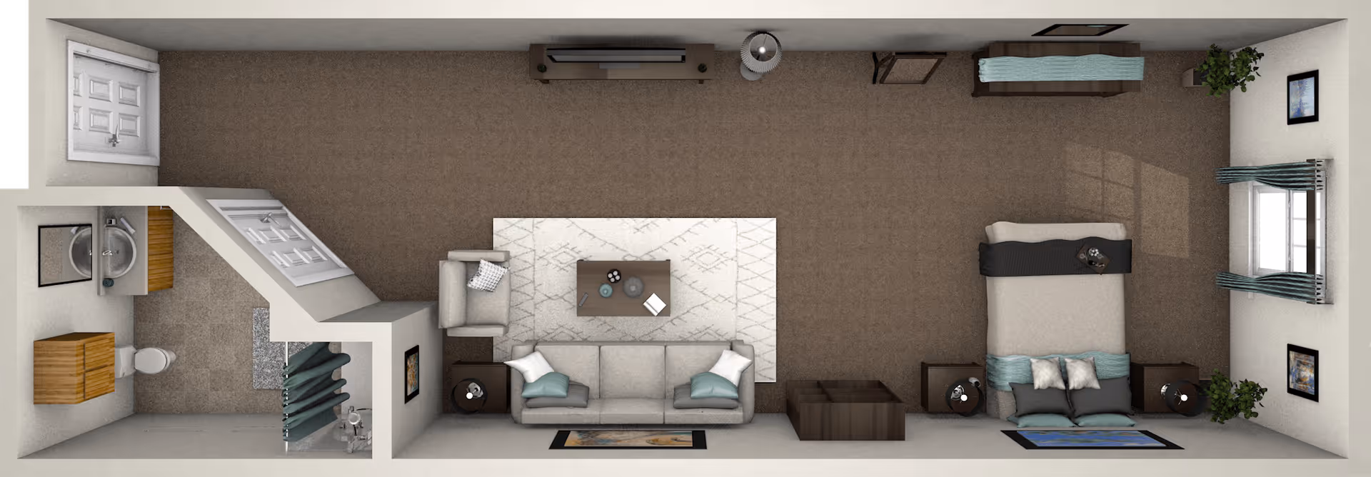 Top-down view of a studio apartment layout featuring a combined living and sleeping area. The living area includes a sofa, armchair, coffee table on a rug, and side tables. The sleeping area has a bed with pillows, nightstands, and a bench at the foot of the bed. There are windows with curtains and framed pictures on the walls. The bathroom includes a toilet, sink with vanity, and a shower with a curtain. The flooring is carpeted in the main area and tiled in the bathroom.