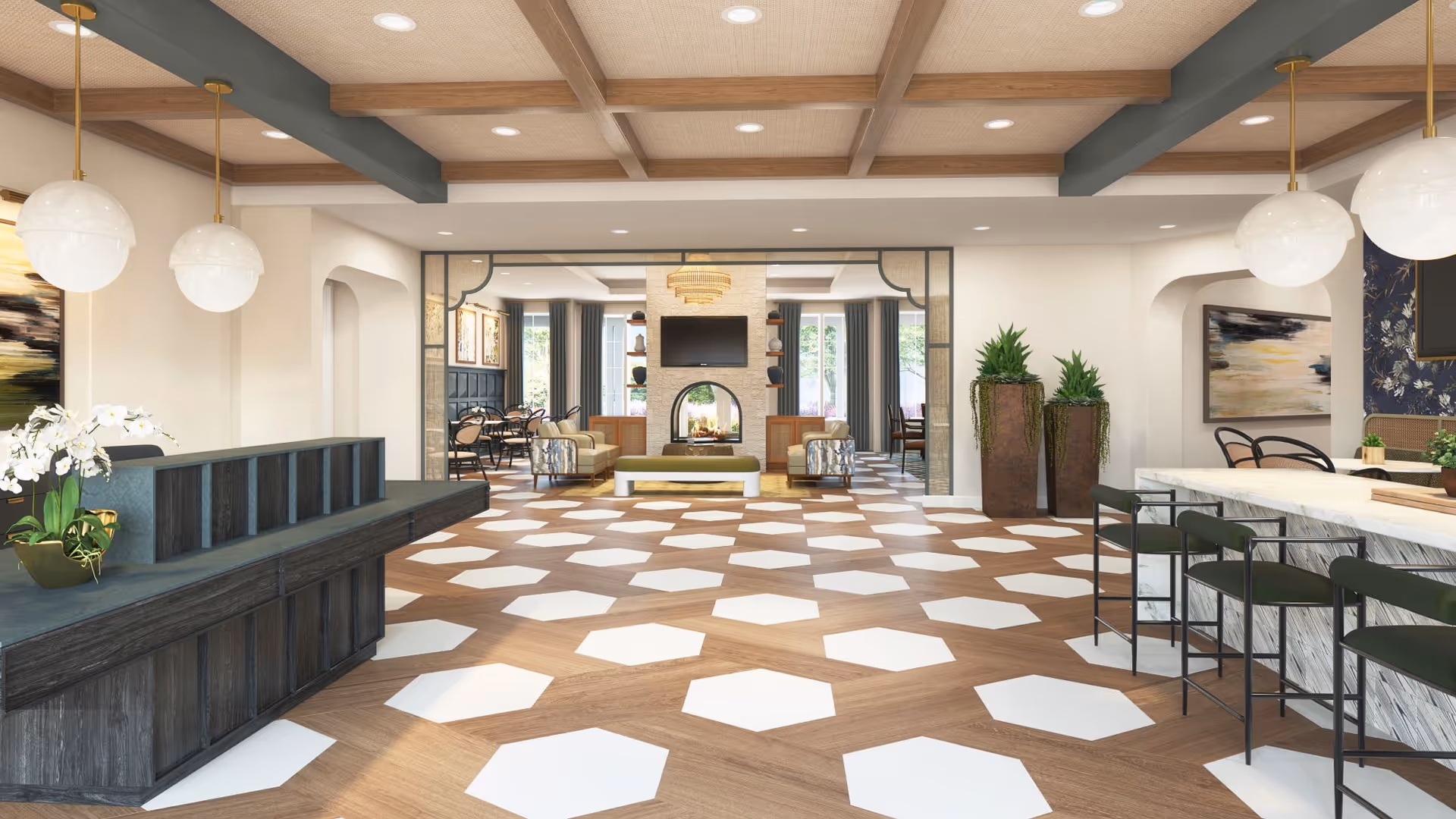 Spacious interior lobby with reception desk, geometric tile floor, fireplace, seating areas, and plants.