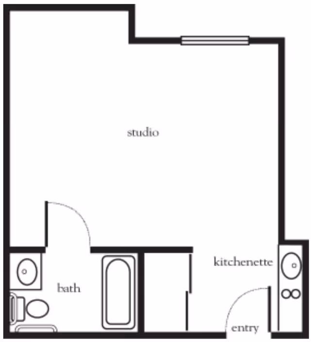 Floor plan of a studio apartment at Atria Del Rey showing a main studio area, a bath with a toilet, sink, and bathtub, a kitchenette, and an entry area.