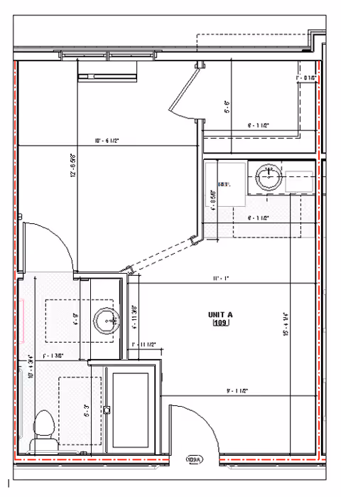 Architectural floor plan of Unit A 109J at Brickmont at Johns Creek, showing layout with dimensions including a bathroom with toilet, sink, and bathtub, a main living area, and additional smaller rooms.