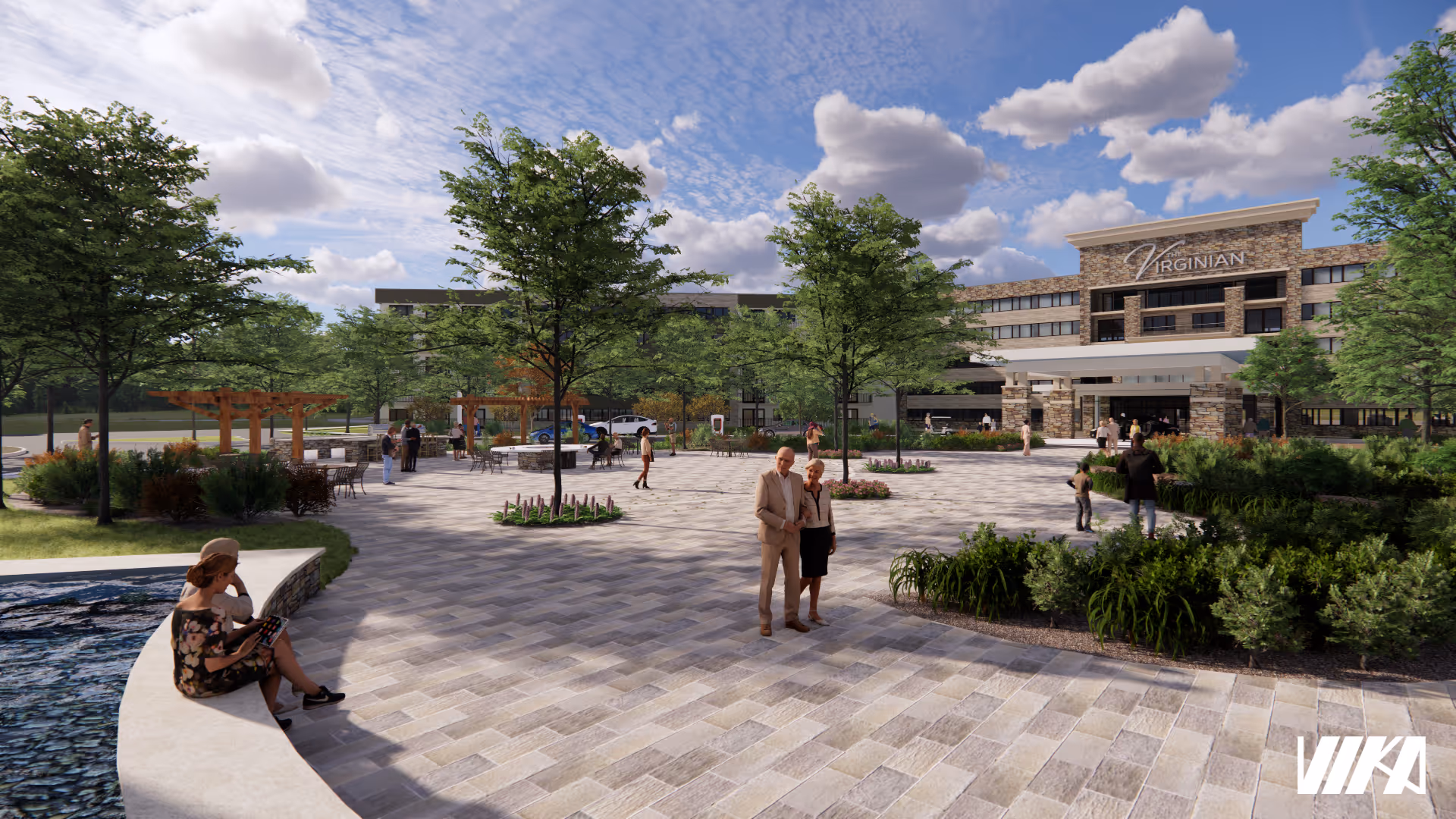 Outdoor courtyard area of The Virginian senior living facility with paved walkways, trees, shrubs, and seating areas. Several people are walking and sitting around the courtyard, and the building entrance is visible in the background under a partly cloudy sky.
