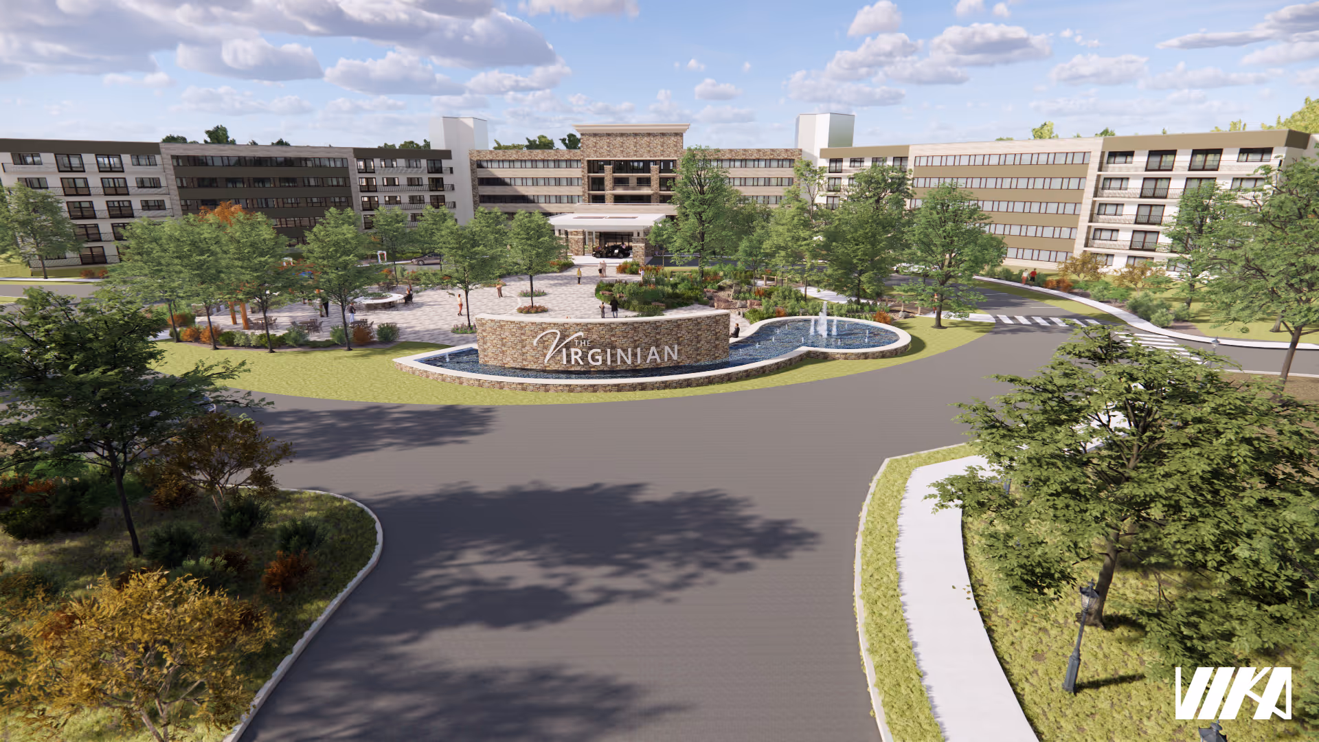 Front exterior view of The Virginian senior living facility showing a large multi-story building with a circular driveway, landscaped greenery, trees, and a water fountain feature with a stone sign displaying the facility's name.