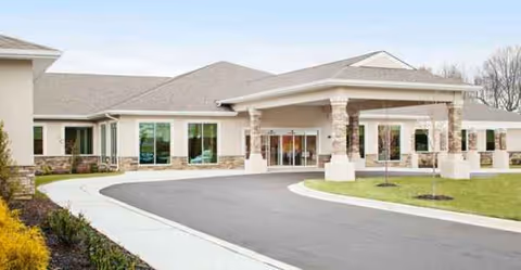 Exterior view of Autumn Lake Healthcare at Waugh Chapel entrance with curved driveway