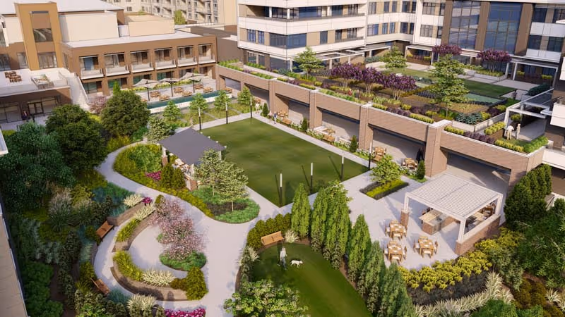 A landscaped rooftop courtyard with lawns, walking paths, seating and pergola areas surrounded by multi-story residential buildings.