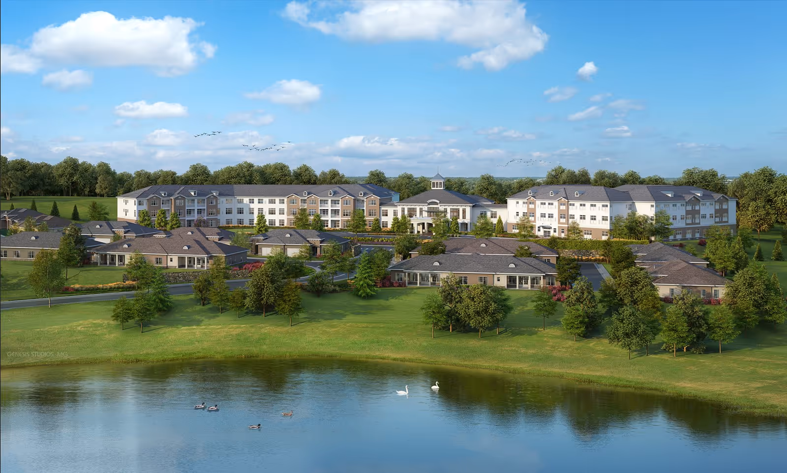 A scenic exterior view of The Sheridan at Eastside senior living facility featuring multiple buildings surrounded by green lawns, trees, and a pond with ducks and swans in the foreground under a partly cloudy blue sky.