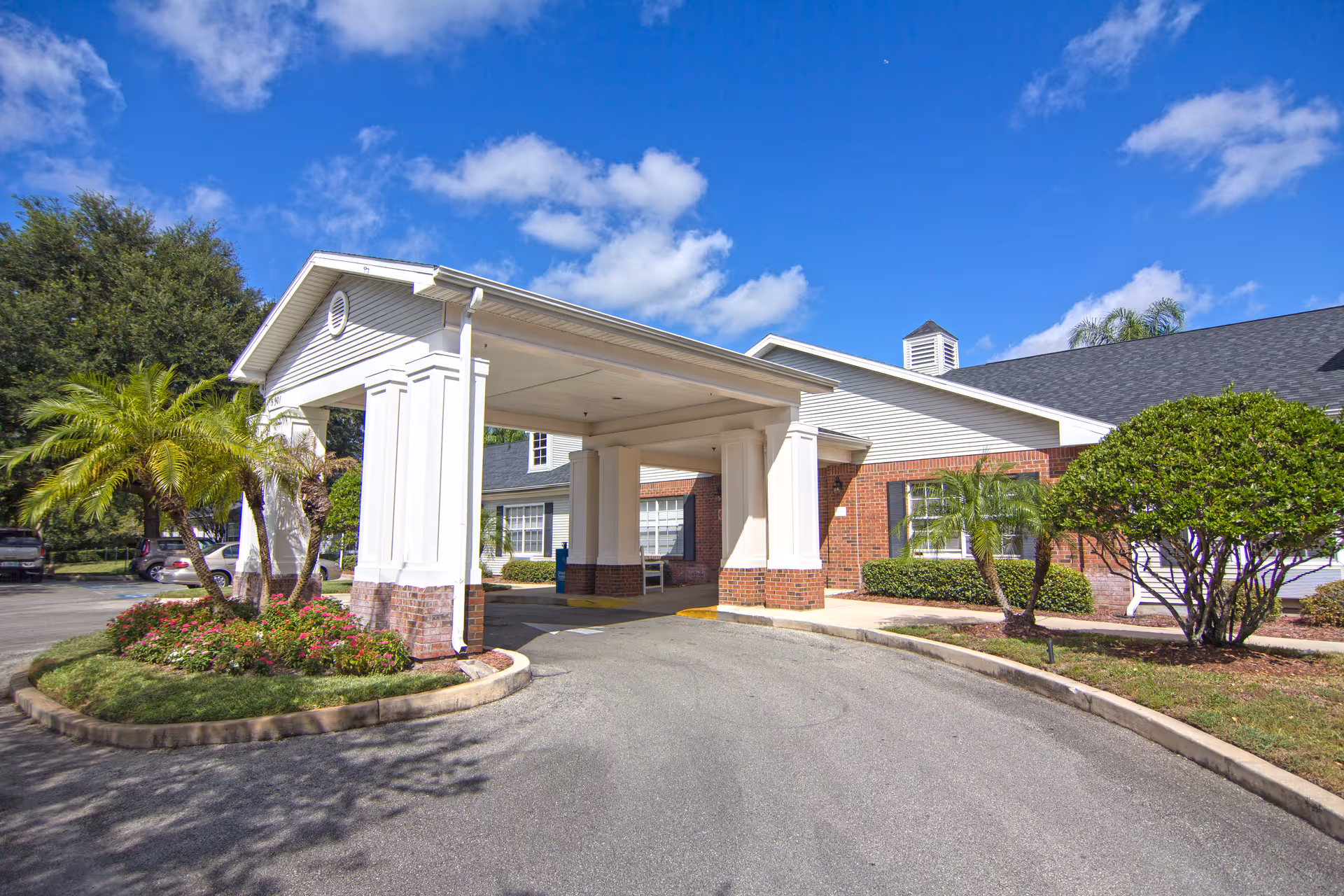Brookdale Conway exterior front entrance with covered drive and landscaping.