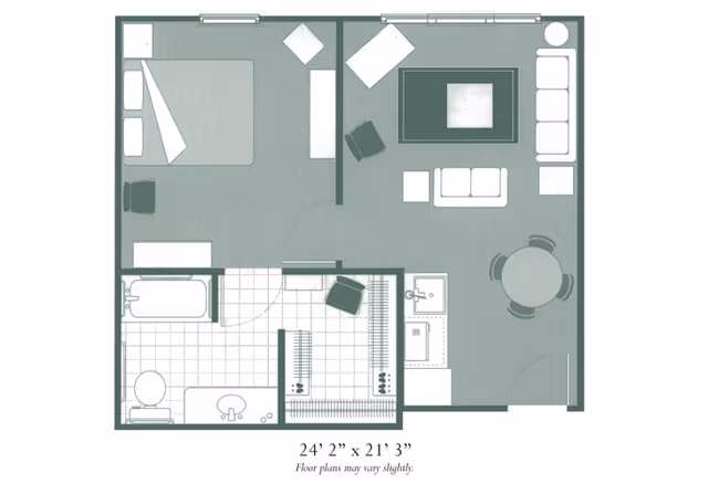 Architectural floor plan of a senior living apartment unit showing a bedroom with a bed and chair, a living room with sofas, chairs, a coffee table, and a dining table with four chairs, a kitchen area with a sink and stove, a bathroom with a bathtub, toilet, and sink, and a closet area. The overall dimensions are 24 feet 2 inches by 21 feet 3 inches.
