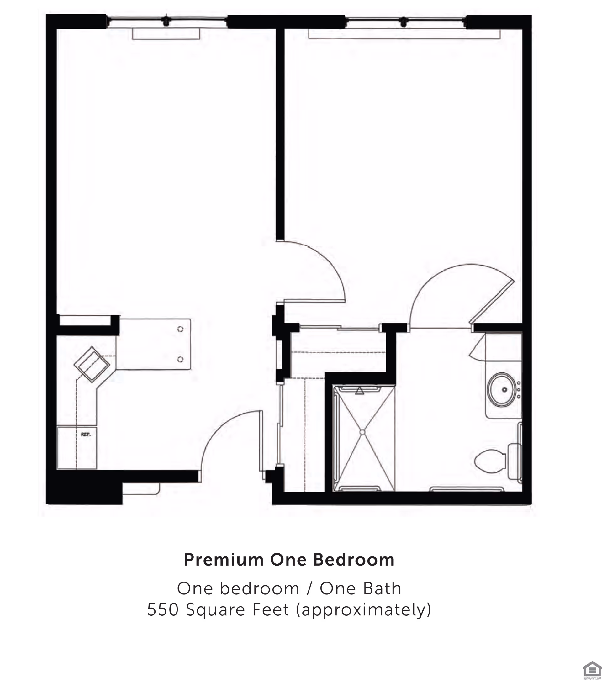 Floor plan of a premium one-bedroom apartment with one bathroom, approximately 550 square feet. The layout includes a kitchen area with a refrigerator, a bedroom, a bathroom with a shower, toilet, and sink, and an entryway.