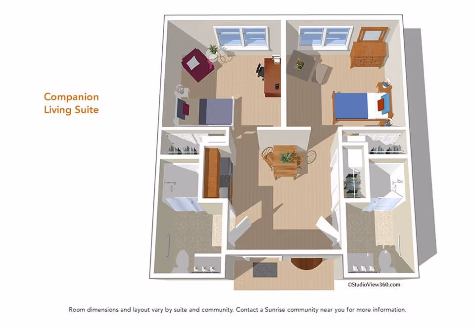 3D floor plan of a companion living suite showing two bedrooms, each with a bed, chair, and dresser. The suite includes two bathrooms, two closets, a central dining area with a table and four chairs, and a small kitchen area. The layout is labeled 'Companion Living Suite'.