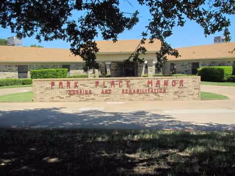Front exterior of Park Place Manor Rehabilitation and Healthcare with brick sign.