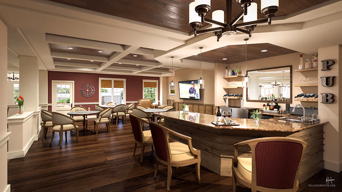 A spacious and well-lit senior living facility common area featuring a large wooden bar with granite countertop and several chairs around it. The bar area has shelves with bottles and glasses, a sink, and a mirror on the wall. To the left, there are multiple round tables with cushioned chairs arranged for dining or socializing. The room has wooden flooring, a coffered ceiling with recessed lighting, and large windows letting in natural light. The word 'PUB' is displayed vertically on the wall near the bar.