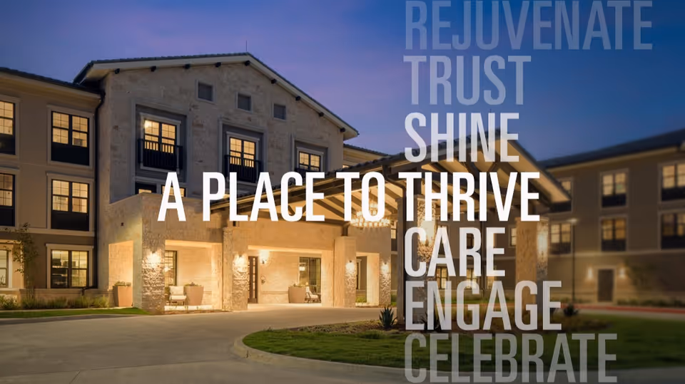 Exterior front entrance of a three-story senior living building at dusk with large promotional text overlaid.