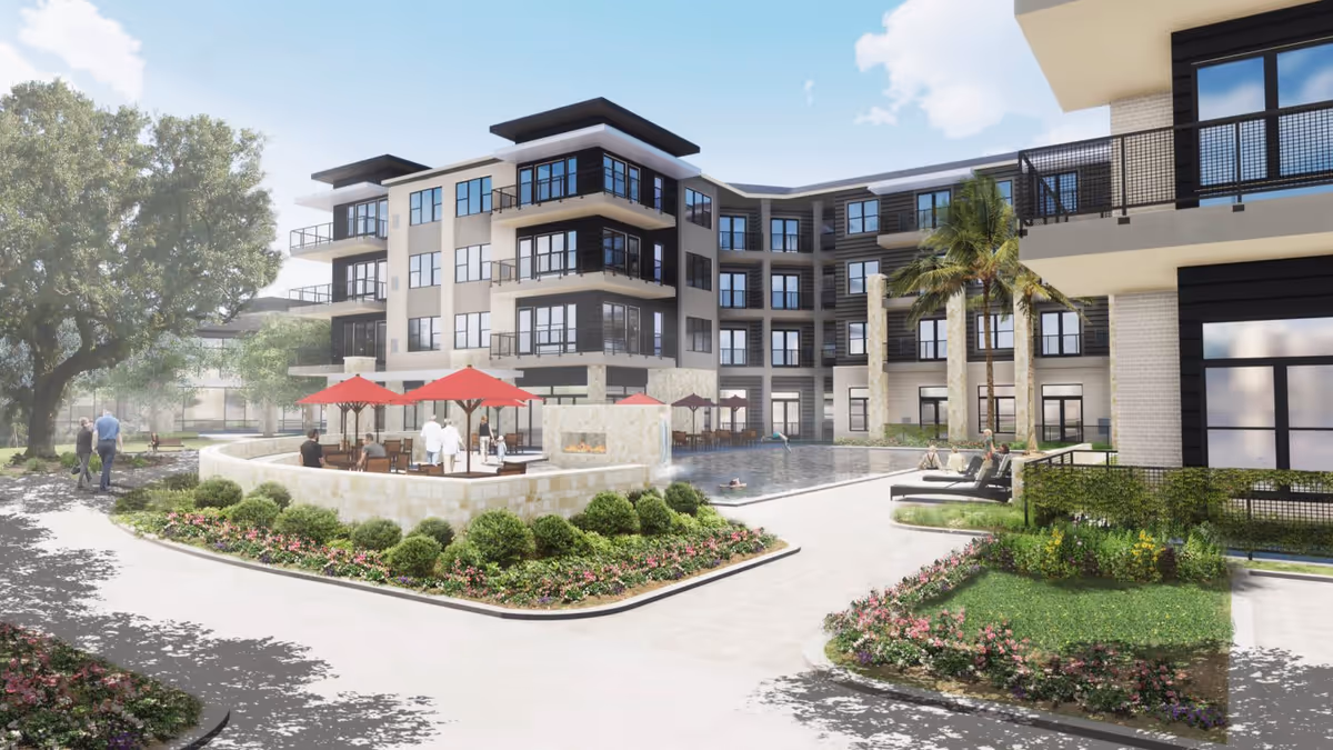 Exterior courtyard of a multi-story senior living facility with a pool, red patio umbrellas, seating areas, and landscaped walkways.