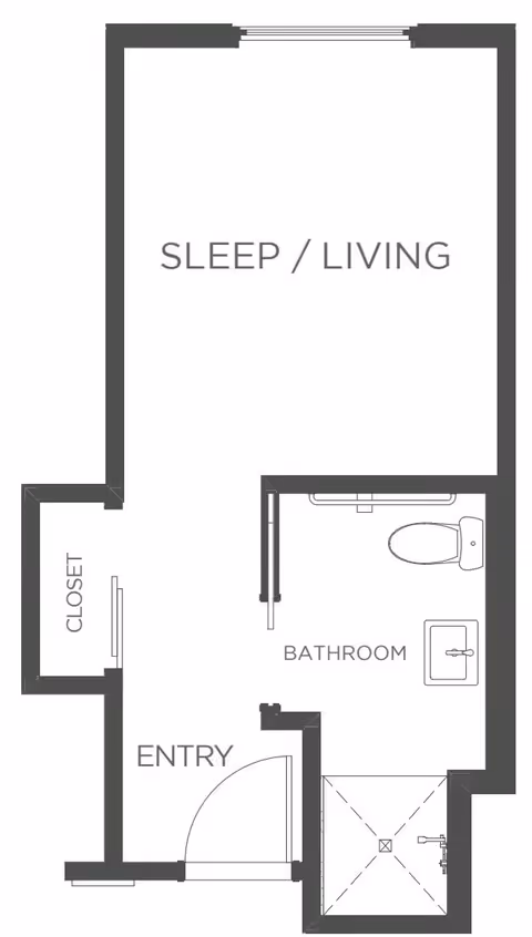 Floor plan layout of a small living space labeled with areas for sleep/living, bathroom, closet, and entry. The bathroom includes a toilet, sink, and shower area.