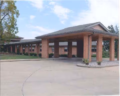 Brick entrance with a porte-cochere at Hillcrest Care Center.