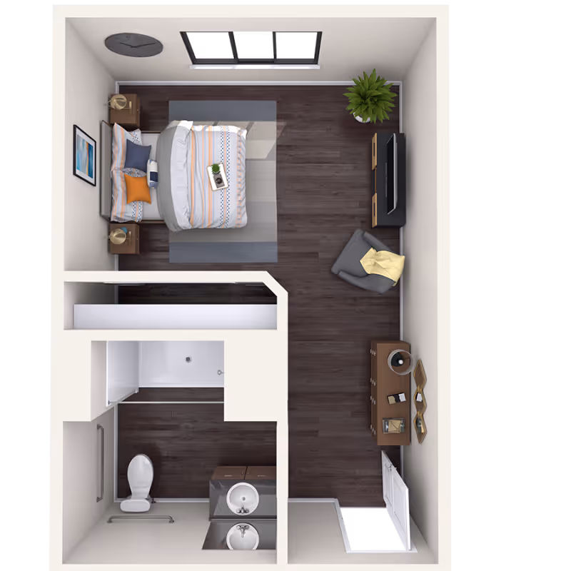 Top-down view of a senior living apartment layout featuring a bedroom with a bed, two nightstands, a clock on the wall, a chair with a yellow blanket, a TV on a stand, a dresser with a lamp and decor, and a bathroom with a toilet, sink, and shower.