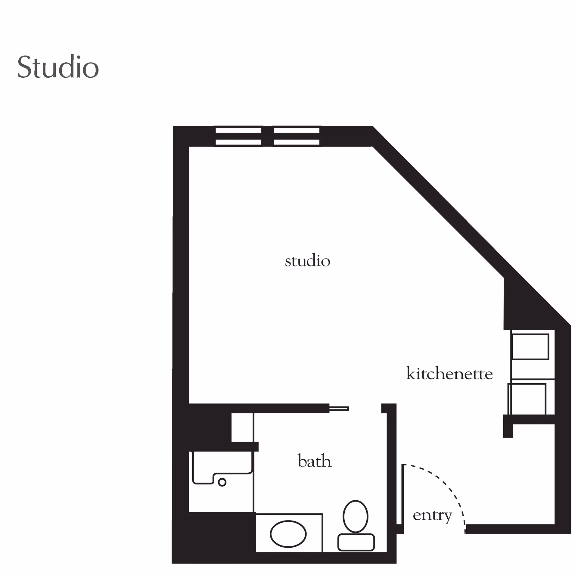 Floor plan of a studio apartment showing a main studio area, a kitchenette, a bathroom with a sink, toilet, and bathtub, and an entry door.