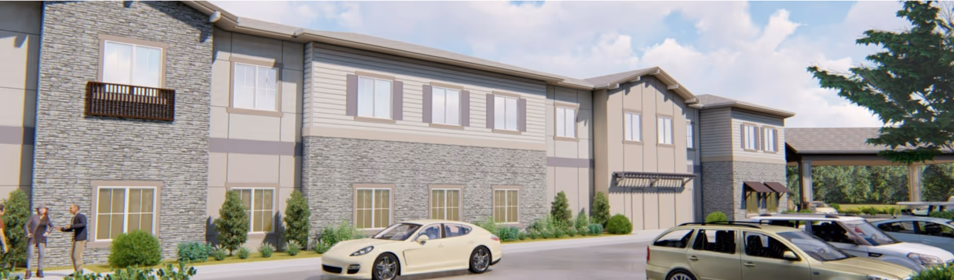 Exterior view of a modern two-story building with stone and siding facade, several windows, and a covered entrance area. There are cars parked in front and two people standing and talking near the building. The sky is partly cloudy.