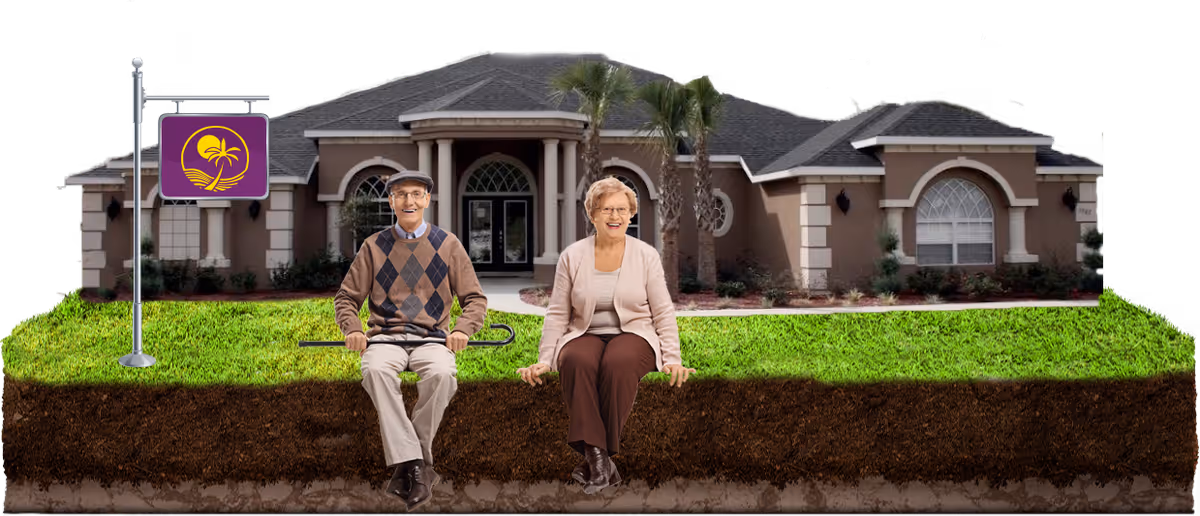 An elderly couple sits on a low ledge in front of a large senior living facility with a manicured lawn and a sign on the left.