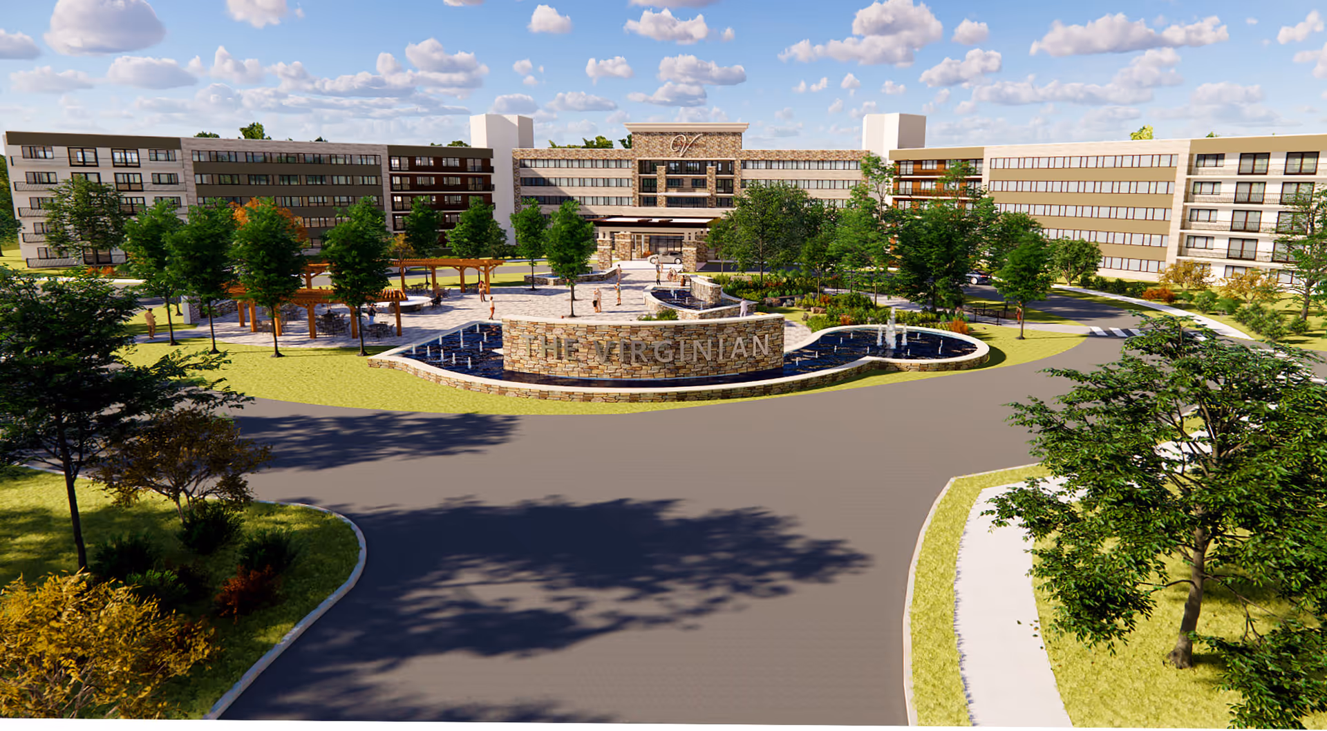 Exterior view of a large senior living facility named The Virginian, featuring a multi-story building with numerous windows, a landscaped entrance with trees, a water fountain, and a stone sign displaying the facility's name. The sky is partly cloudy with blue skies.