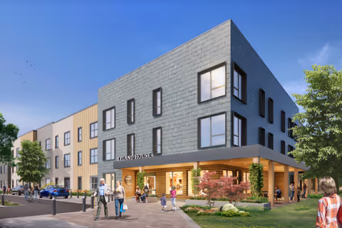 Modern three-story senior living building labeled "Leland House" with people walking by a landscaped entrance.