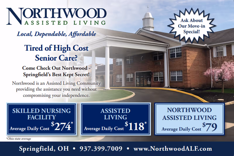 Advertisement for Northwood Assisted Living showing the front exterior of a brick building with white columns and a driveway. The ad highlights affordable senior care options with average daily costs for skilled nursing facility, assisted living, and Northwood assisted living. There is a callout for a move-in special and contact information including a phone number and website.