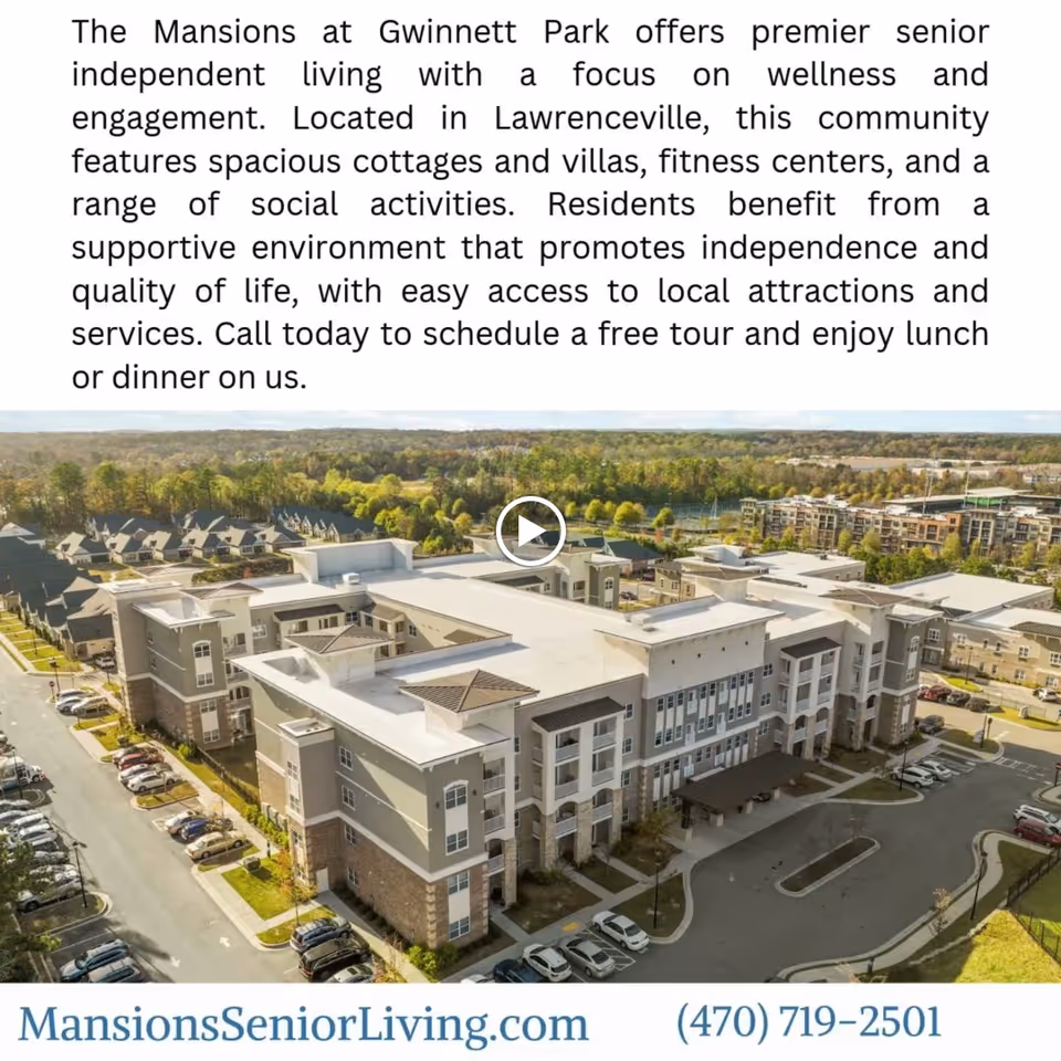 Aerial view of The Mansions at Gwinnett Park senior independent living facility showing a large multi-story building with parking lots and surrounding greenery under a clear sky.