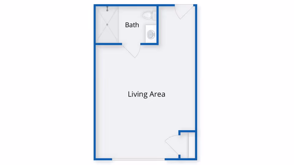 Floor plan layout showing a living area with an attached bathroom that includes a shower, toilet, and sink.