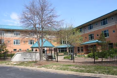 Exterior view of Barnes-Jewish Extended Care building with brick facade and entrance sign.