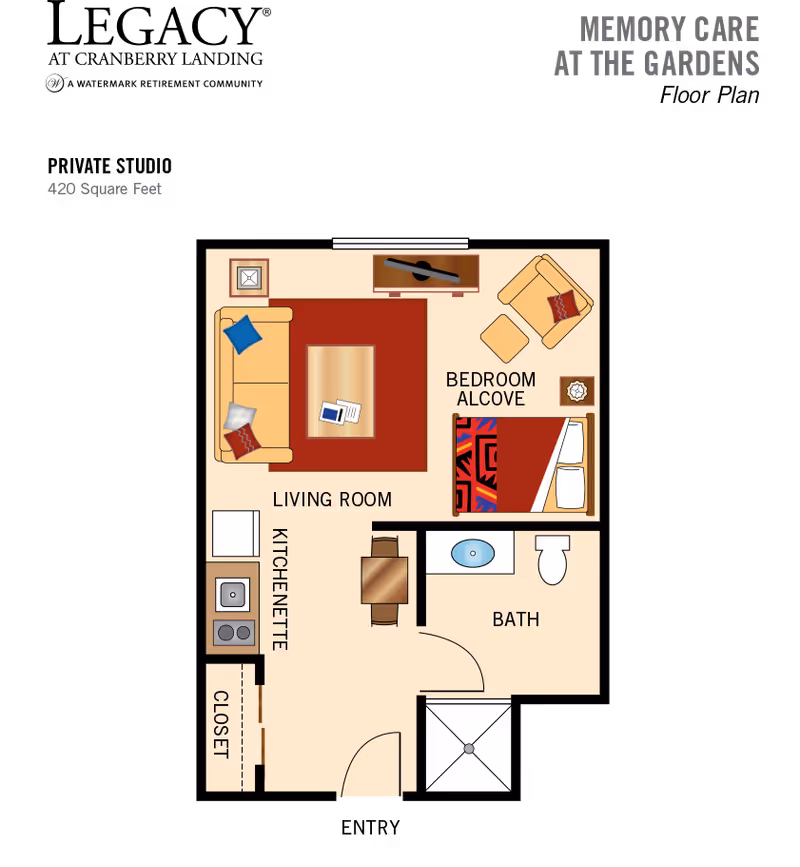 Top-down colored floor plan of a small studio apartment showing a living room with sofa and rug, kitchenette, bedroom alcove, and bathroom.