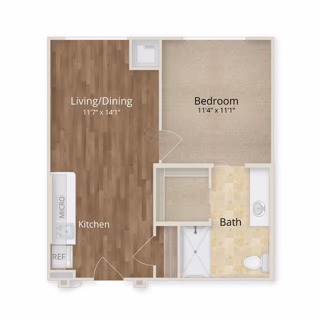 Floor plan of a one-bedroom apartment at The Grandview of Chisholm Trail showing a combined living and dining area with wood flooring, a kitchen area with a refrigerator and microwave, a bedroom with carpet flooring, and a bathroom with a shower, toilet, and sink.