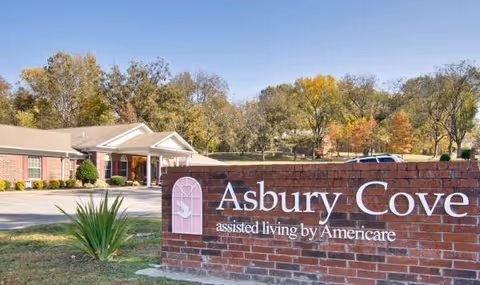 Front view of Asbury Cove assisted living facility sign.