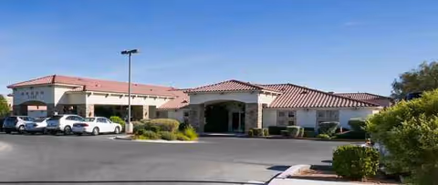 Silver Hills Health Care Center exterior with parking lot and landscaped entrance.