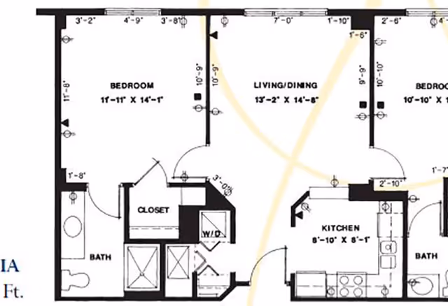 Architectural floor plan showing a layout with two bedrooms, two bathrooms, a living/dining area, a kitchen, closets, and a washer/dryer area.