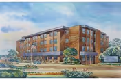 Illustration of a four-story brick building with multiple windows, surrounded by trees and landscaping, under a partly cloudy sky. There is a sign near the entrance and a driveway leading up to the building.