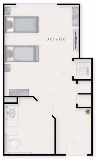 Floor plan of a small living space featuring two single beds, a bathroom with a toilet and sink, a small closet area, and an air conditioning unit. The room measures 10 feet 10 inches by 12 feet 8 inches.