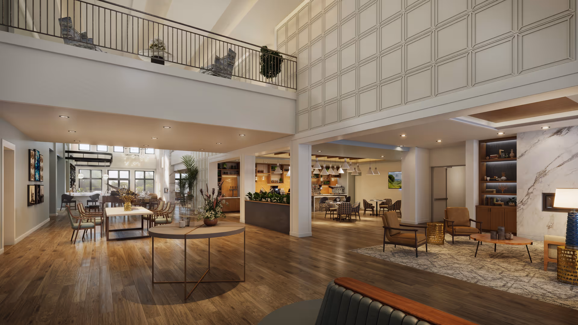 Spacious two-story common area with wood floors, seating groups, dining tables, and a mezzanine overlooking the lobby.