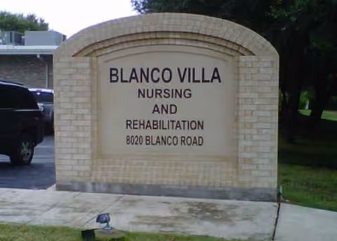 Brick sign reads Blanco Villa Nursing and Rehabilitation at 8020 Blanco Road.