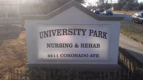 Outdoor sign for University Park Nursing & Rehab in front of the facility.