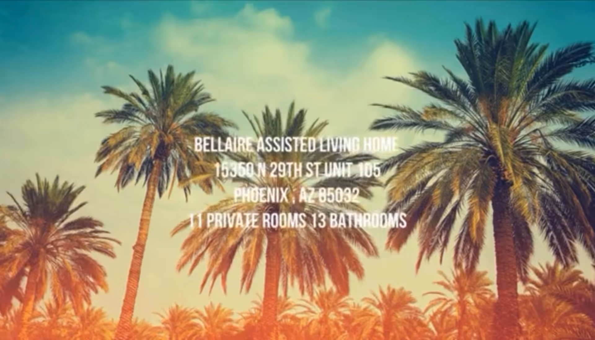 Tall palm trees under a partly cloudy sky with text overlay providing address and details of Bellaire Assisted Living Home in Phoenix, Arizona.
