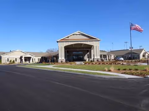 Exterior view of Morning Pointe of Chattanooga at Shallowford, showing the entrance and parking.