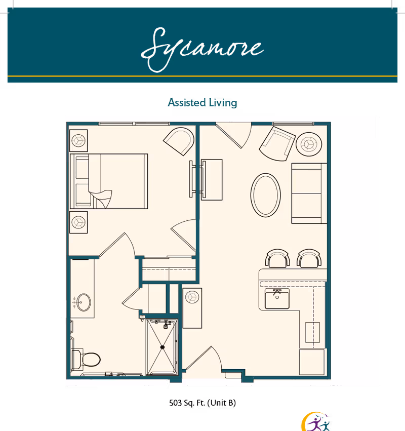 Floor plan of the Sycamore assisted living unit at Village on the Park McKinney, showing a bedroom with a bed and two nightstands, a bathroom with a toilet, sink, and shower, and a living area with a sofa, two chairs, a coffee table, and a kitchen area with a sink and two bar stools.